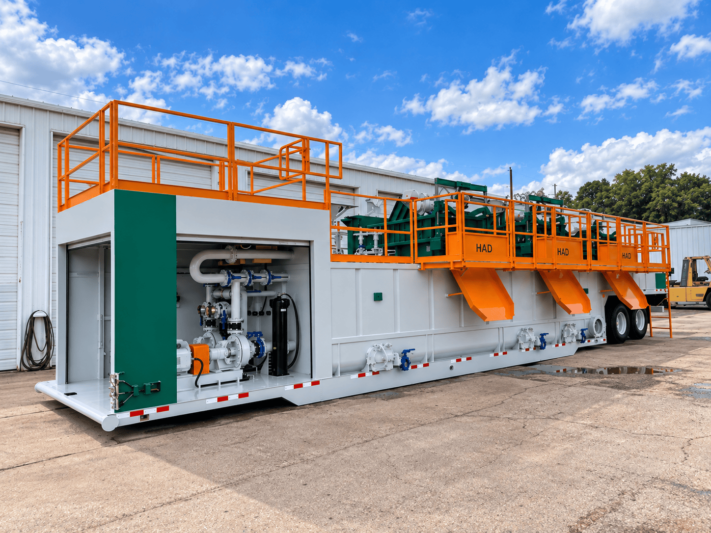 Custom Triflo Rockover dewatering system with roll-up pump-enclosure doors open