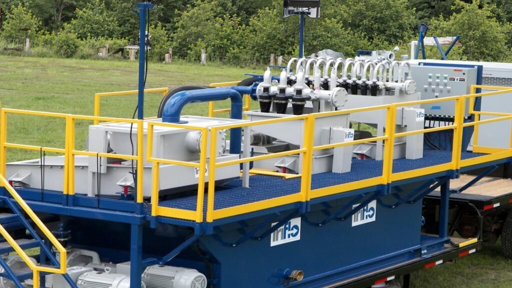 Triflo ES 300 environmental dewatering system equipped with shaker screens and hydrocyclones at an outdoor site.